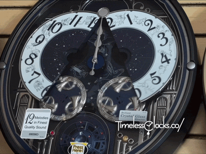Seiko QXM393NRH “Galaxy Constellations” Astrology-Themed Melodies in Motion Moving Dial Musical Wall Clock with Luminous Dial & 12 Songs