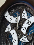 Seiko QXM609NRH “Opera” Melodies in Motion Dancing Dial Musical Wooden Wall Clock with 36 Songs