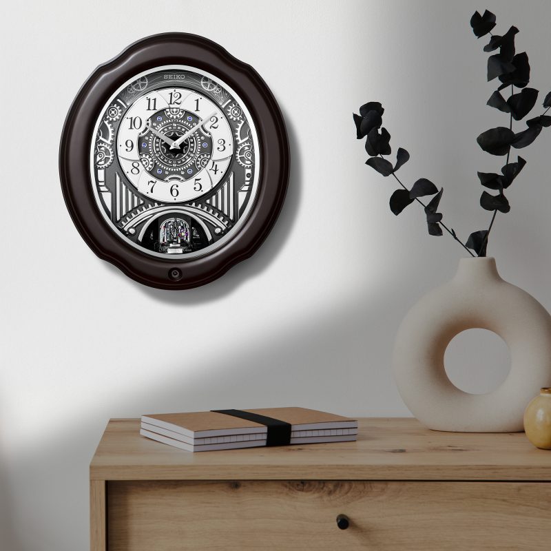 Seiko QXM609NRH “Opera” Melodies in Motion Dancing Dial Musical Wooden Wall Clock