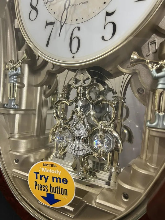 Rhythm "Trumpet Boys" Musical Motion Decorative Pendulum Wall Clock - 4MJ895WD23