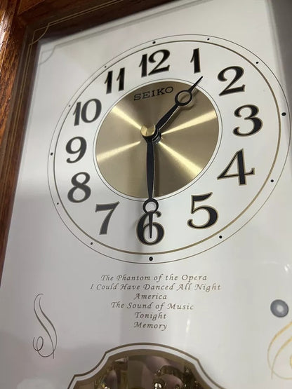 Seiko QXW114BLH "Broadway Oak" Wooden Musical Motion Decorative Pendulum Mantel Clock with Popular Melodies