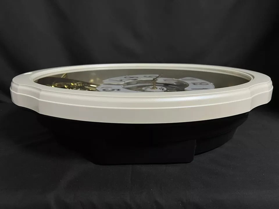 Rhythm "Marvelous Pearl" Magic Motion Musical Wall Clock with Moving Dial - 4MH427WU03