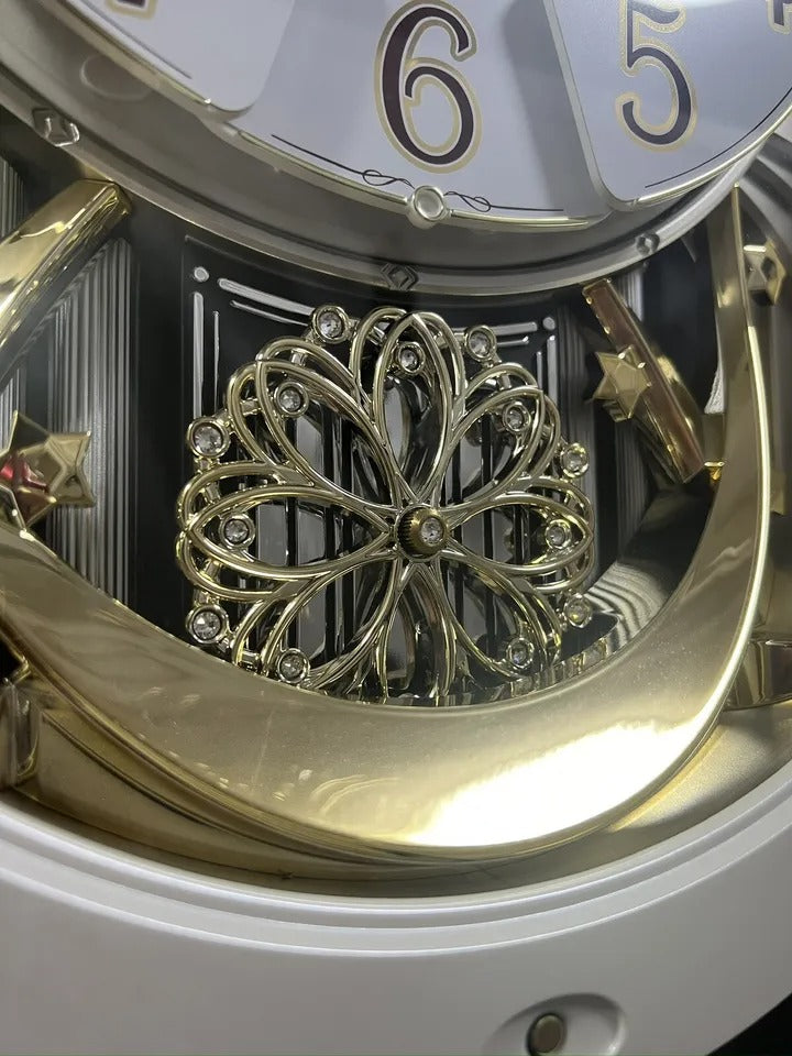 Rhythm "Marvelous Pearl" Magic Motion Musical Wall Clock with Moving Dial - 4MH427WU03
