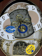 Rhythm “Palacio” Moving Dial Magic Motion Musical Wall Clock - 4MH439WU06