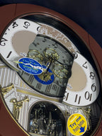 Rhythm “Palacio” Moving Dial Magic Motion Musical Wall Clock - 4MH439WU06