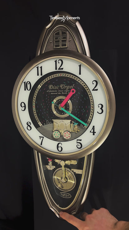 Rhythm "Calliope Phonograph" Magic Motion Musical Wall Clock with Moving Animation - 4MH714RH08