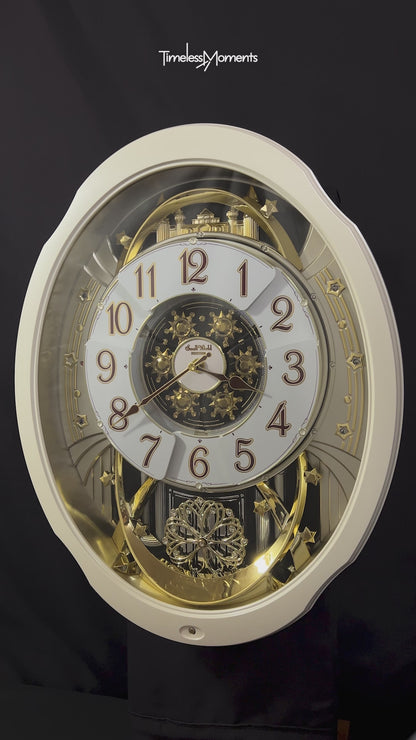Rhythm "Marvelous Pearl" Magic Motion Musical Wall Clock with Moving Dial - 4MH427WU03