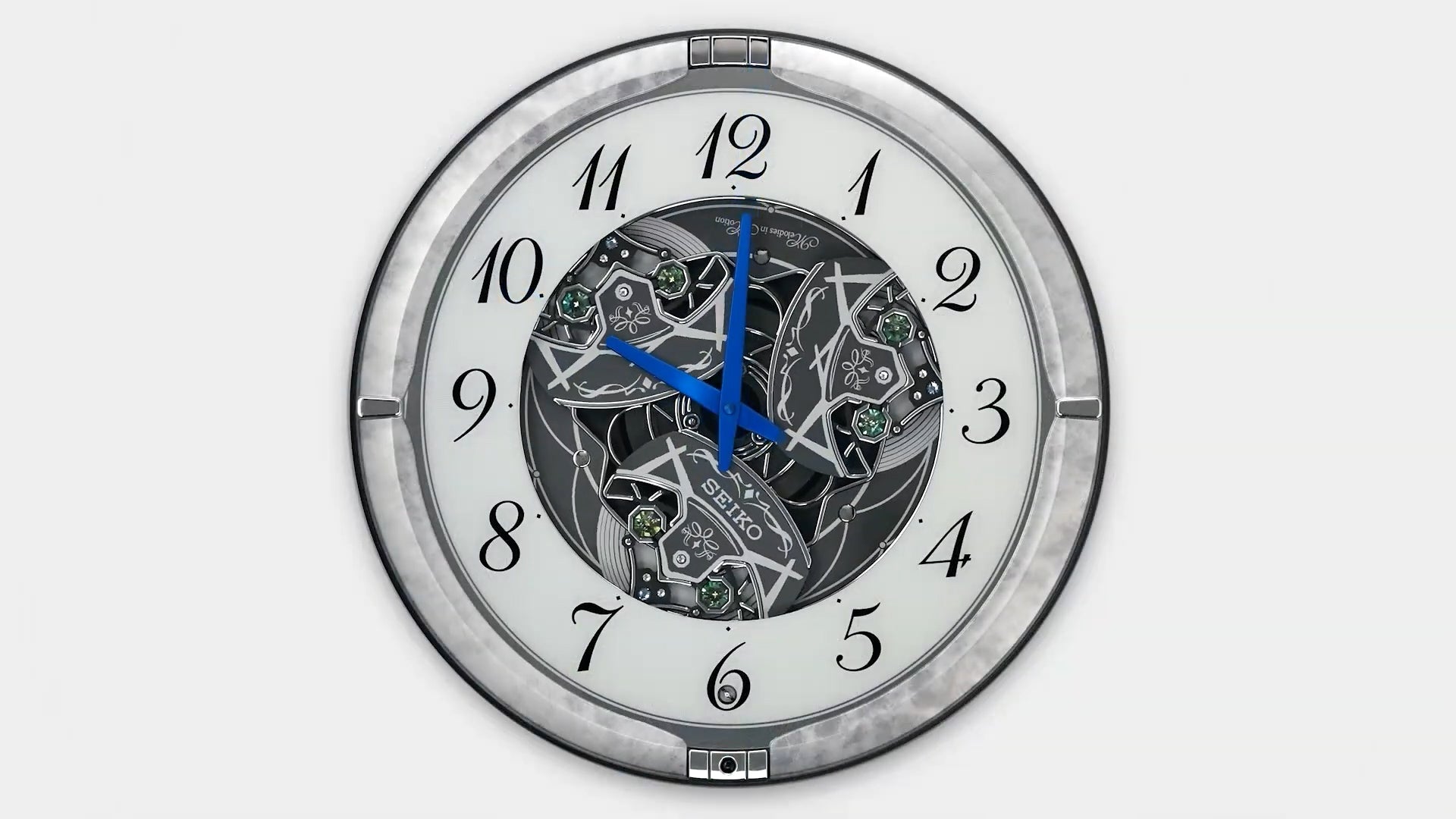 Seiko QXM397SRH “Winter King” Melodies in Motion Dancing Dial