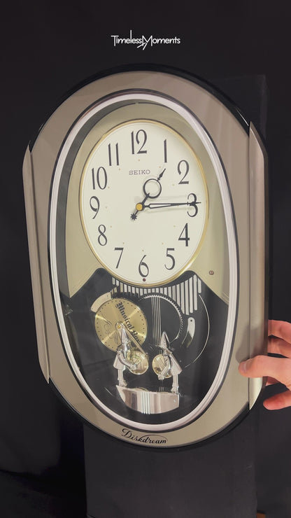 Seiko RE528S "Diskdream Music Box" Musical Motion Wall Clock from Japan with Moving Figurines