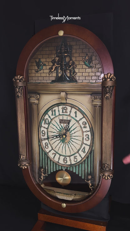 Rhythm “CTS Sundial” Gothic Wooden Musical Motion Pendulum Wall Clock with Popular Melodies - CMJ336UR06