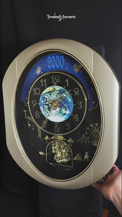 Rhythm “Timecracker 2000” Limited Edition Moving Earth Dial Magic Motion Musical Wall Clock with Popular Melodies - 4MH751NR19