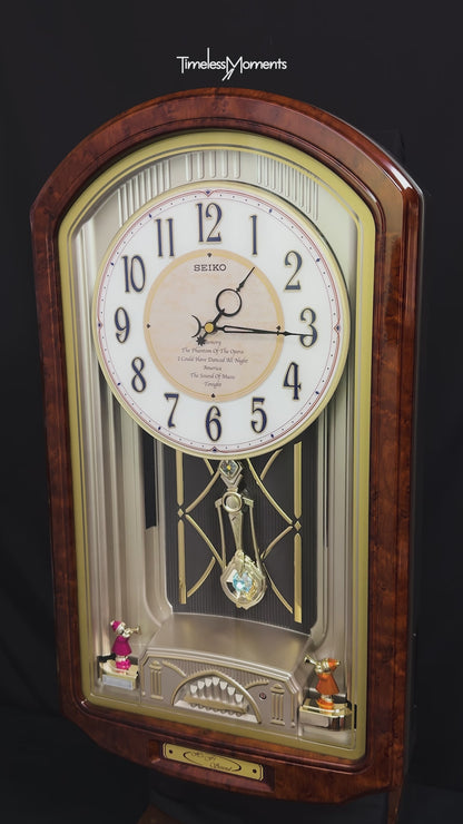 Seiko QXM123BRH "Broadway Showtunes Dropping Dial" Melodies in Motion Musical Moving Wall Clock with Popular Melodies
