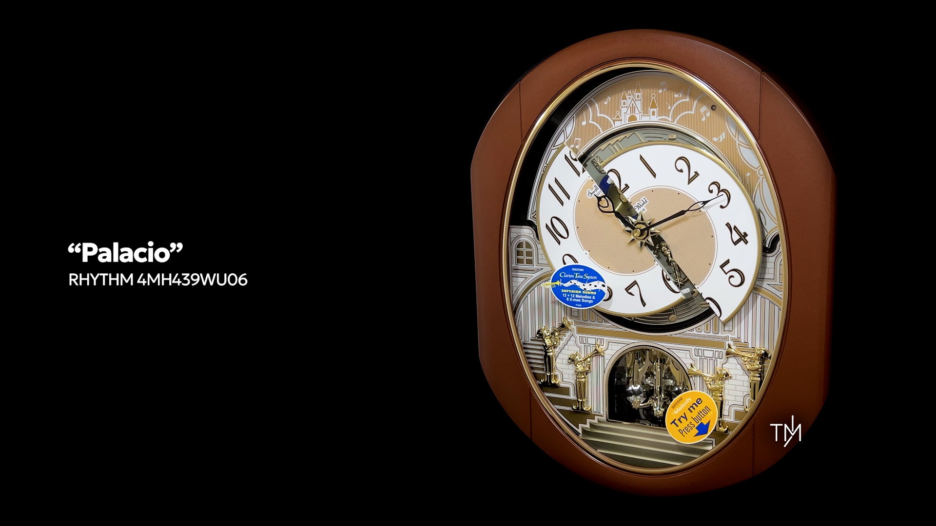 Rhythm “Palacio” Moving Dial Magic Motion Musical Wall Clock