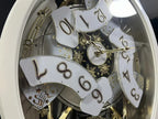 Rhythm "Marvelous Pearl" Magic Motion Musical Wall Clock with Moving Dial - 4MH427WU03
