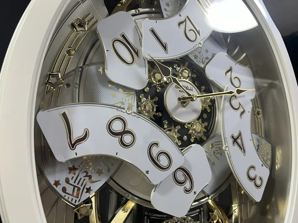 Rhythm "Marvelous Pearl" Magic Motion Musical Wall Clock with Moving Dial - 4MH427WU03