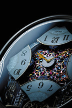 Seiko QXM239SRH "Celebration" Melodies in Motion Musical Wall Clock with Animated Moving Dial & 6 Songs