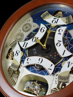 Seiko QXM376BRH “Bright Starry Night” Melodies in Motion Dancing Dial Musical Wooden Wall Clock with 19 Songs