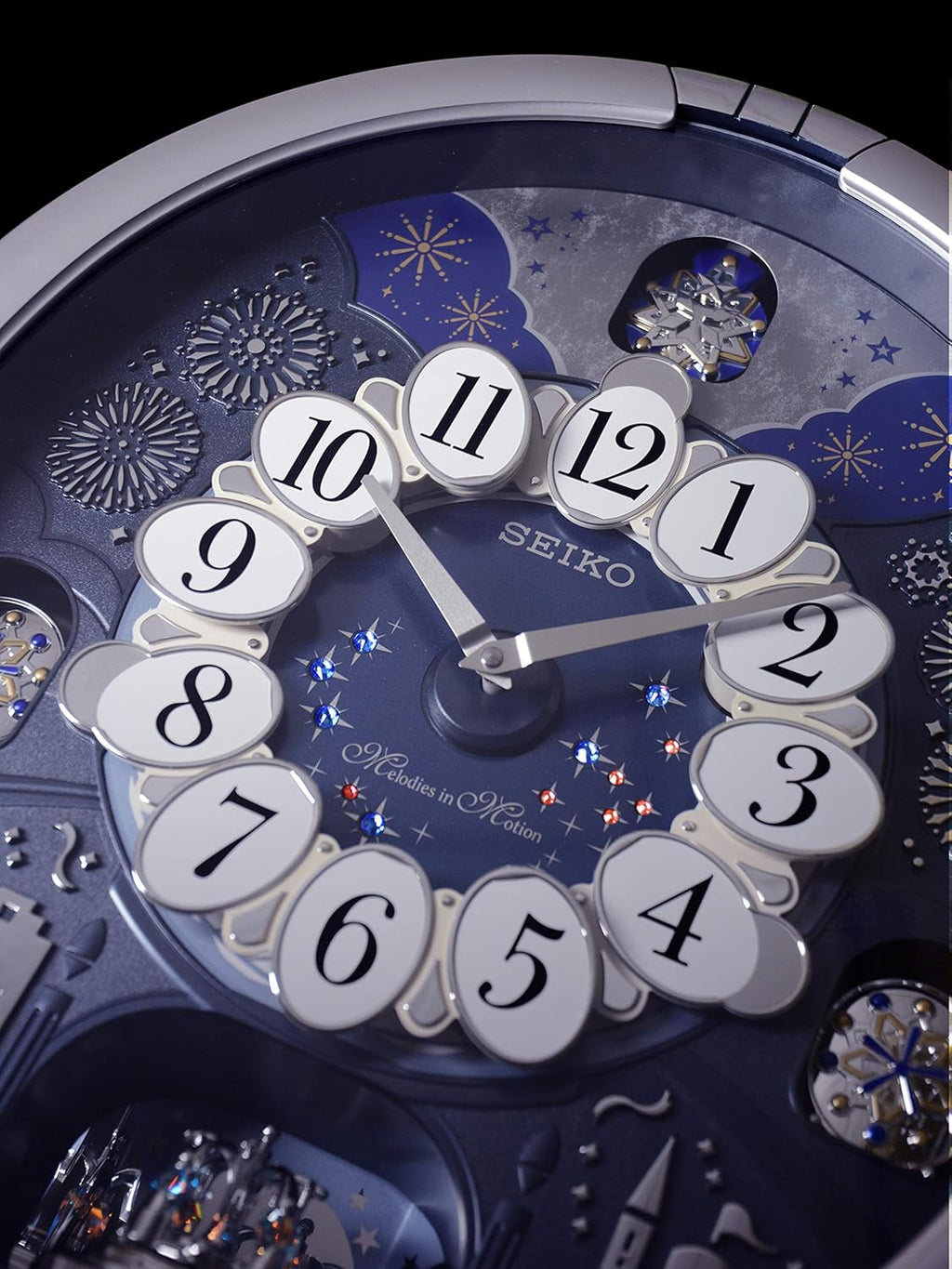 Seiko QXM379SRH “Glittering Starry Night” Melodies in Motion Dancing Dial Musical Wall Clock with 19 Songs