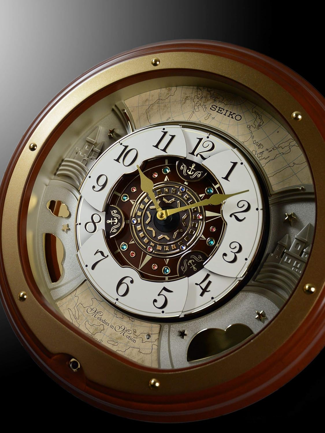 Seiko QXM381BRH “Atlas” Melodies in Motion Dancing Dial Musical Wooden Wall Clock with 18 Songs